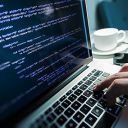 Programming Work Time. Programmer Typing New Lines of HTML Code. Laptop and Hand Closeup. Working Time. Web Design Business Concept.